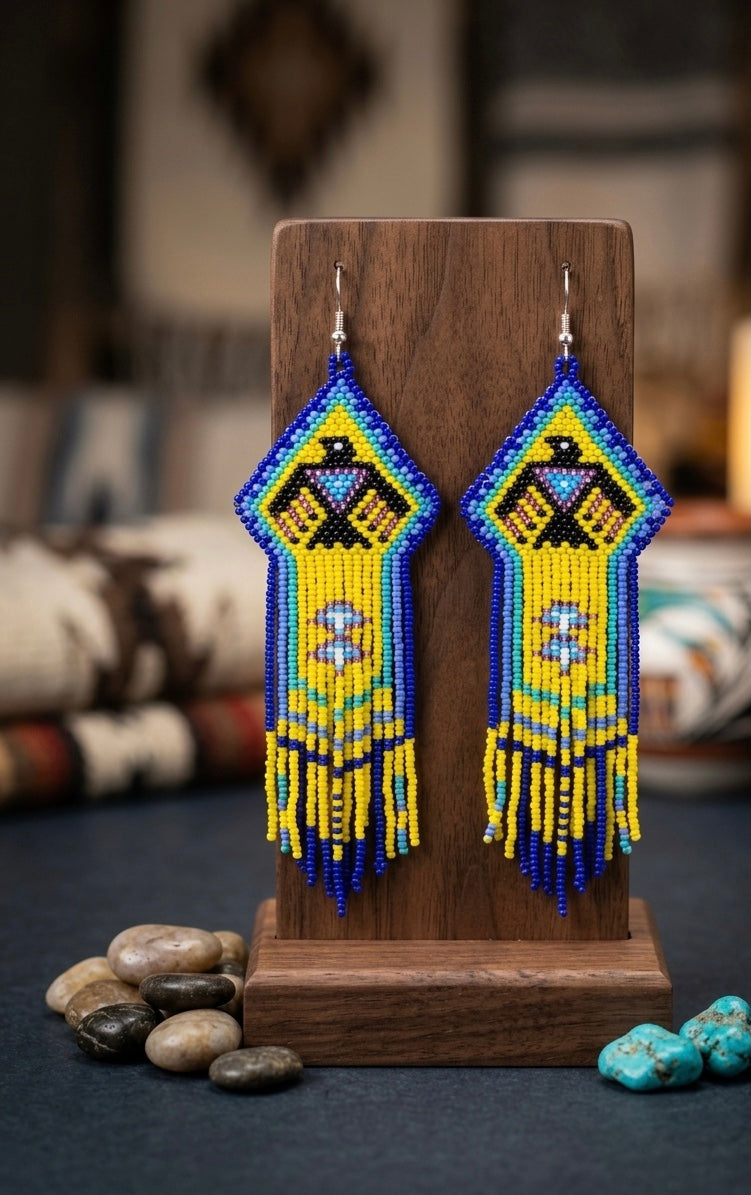 Beaded thunderbird earrings yellow / purple