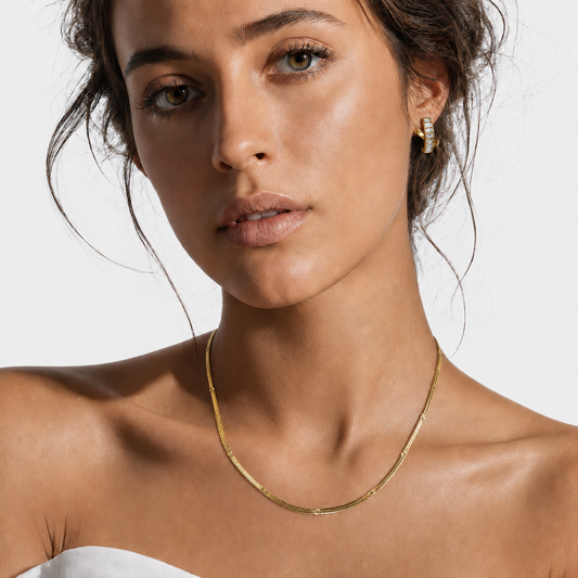 CARBIS: Retro Style Crossover Zirconia Embedded Earrings in Gold