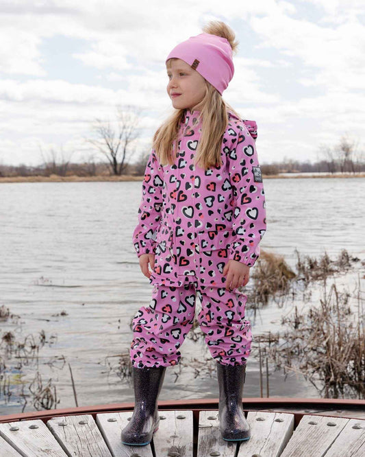 Pink rain jumpsuit with color-changing hearts print