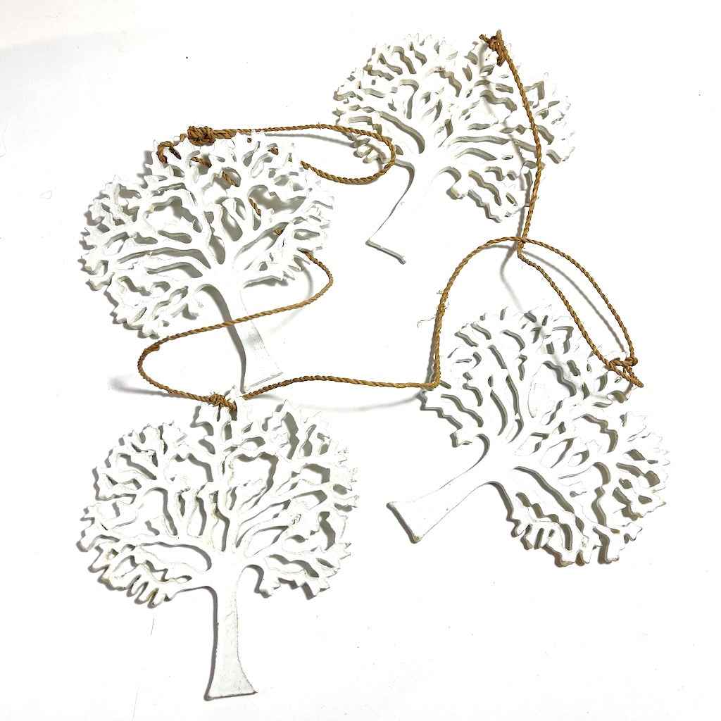 String Of Five White Wooden Trees