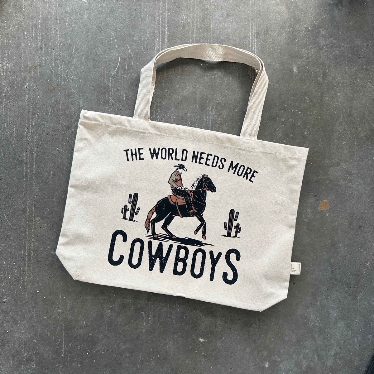 The World Needs More Cowboys Tote Bag
