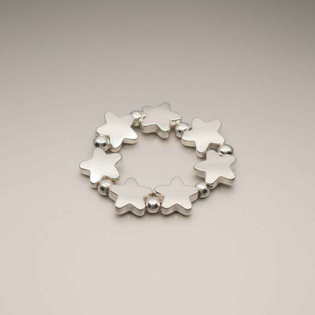 Elasticated Star Ring In Silver Plate