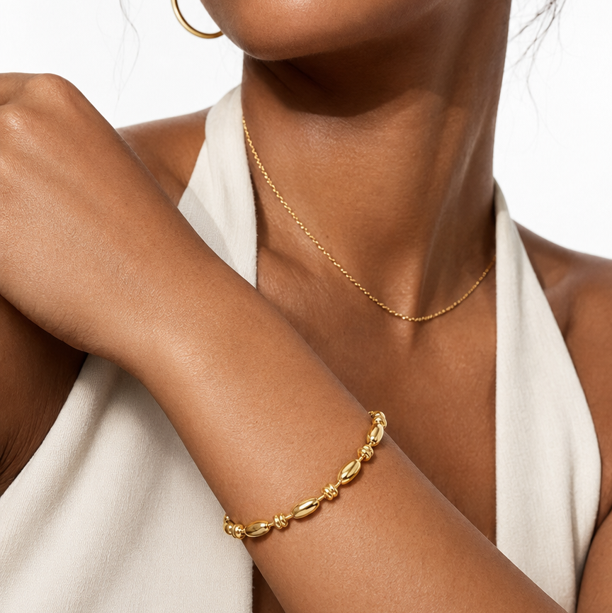 ADIATA Gold: Polished Oval Bead Bracelet – Sculpted Statement Jewellery