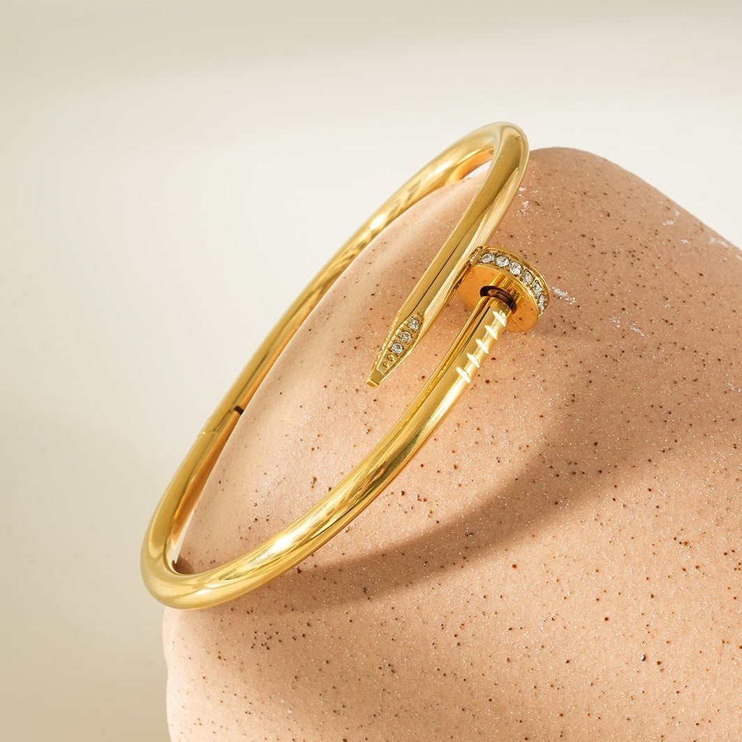 DAVIDKA Gold: Zirconia Embedded Industrial-Chic Twisted Nail Bracelet