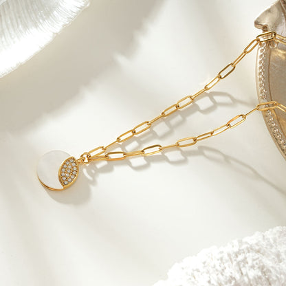 MOGGNA Gold: Coastal Shell Charm Necklace with Oval-Cut Zirconia Inlay