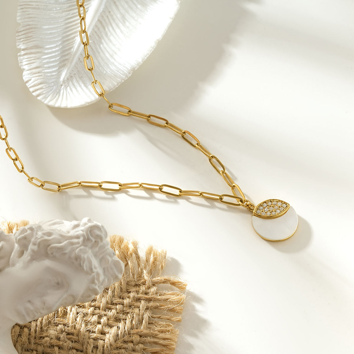 MOGGNA Gold: Coastal Shell Charm Necklace with Oval-Cut Zirconia Inlay
