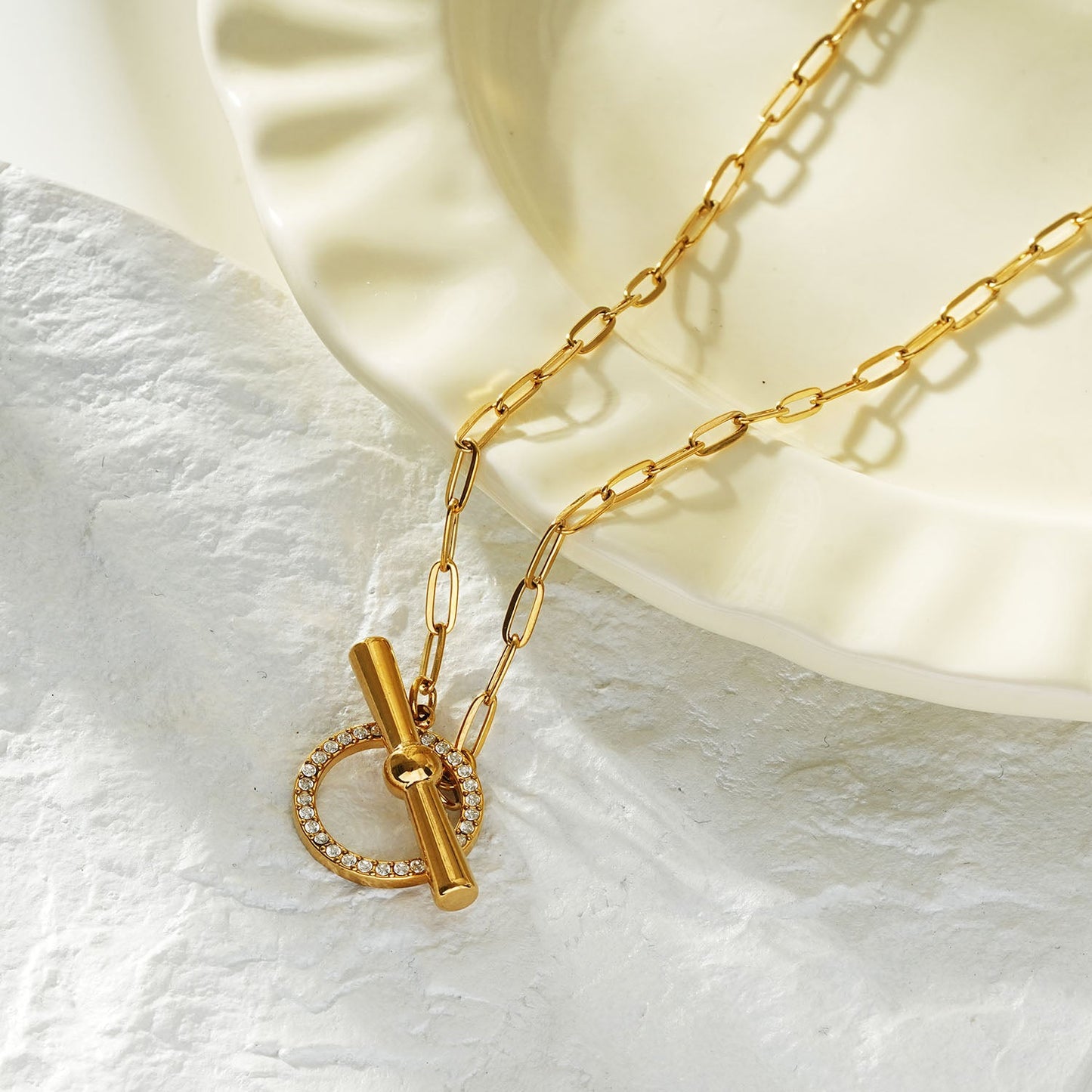 SADIKA Gold: Modern Pavé Zirconia Halo Toggle Necklace