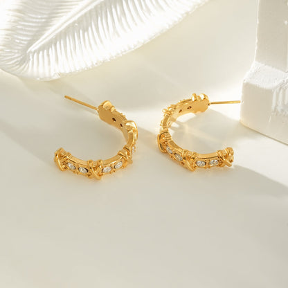 ELICA Gold: Zirconia Embedded Hoop Earrings with Ornate Detail &  Crisscross Accents