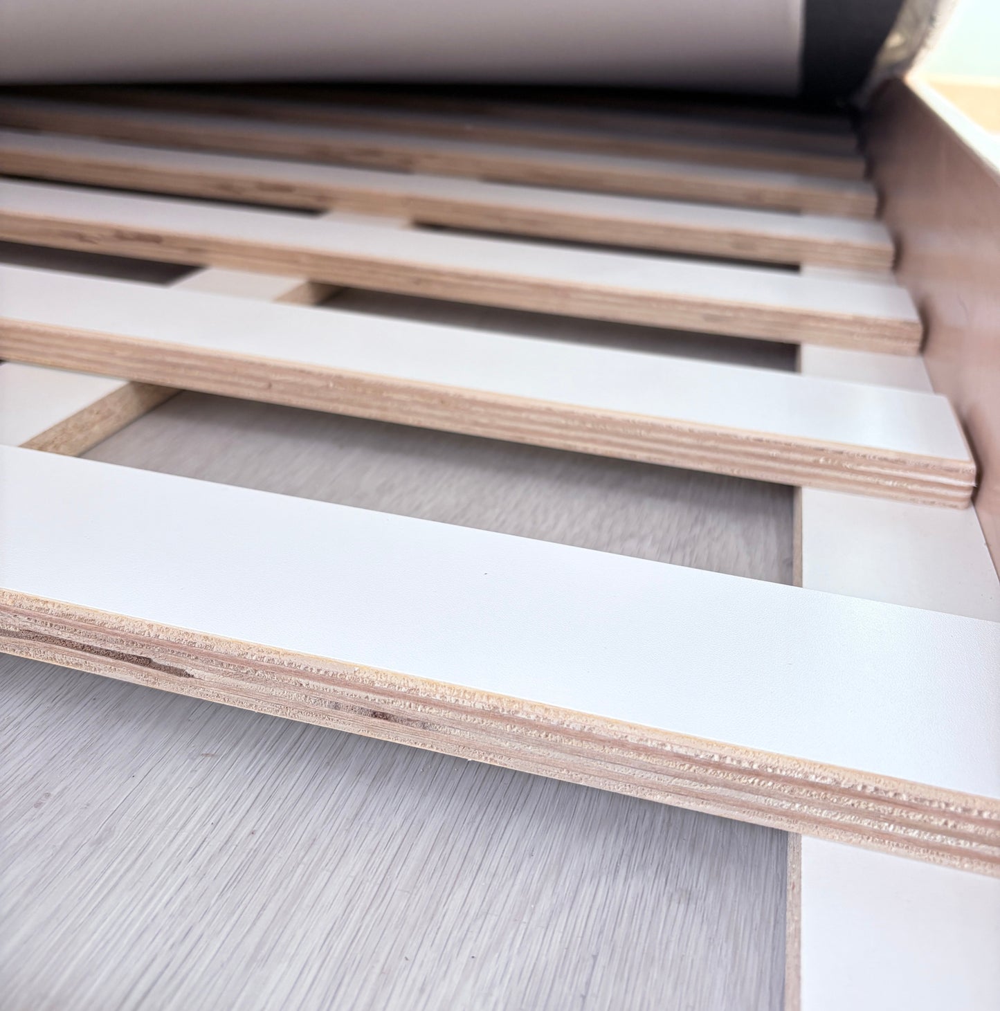 APPLE JUNIOR - Montessori Floor Bed with Rails & Shelves