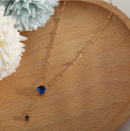 IZZY Crystal Pendant & Charm Gold Necklace