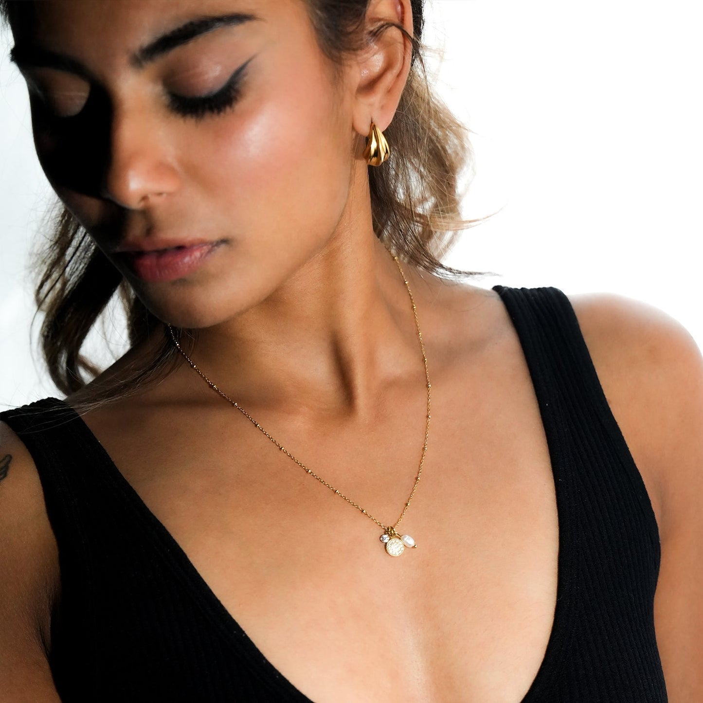 KAAMIL Gold: Retro Art Deco Charms Necklace with a Beaded Chain
