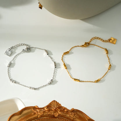 RITIKA: Tiny Square-Beads Dainty Chain Bracelet in White Gold (Silver Toned)
