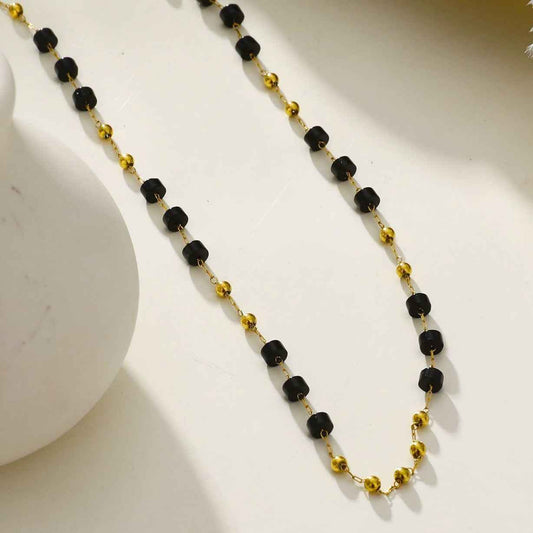 SANTA CRUZ Black: Gold & Black Onyx Beaded Chain Necklace